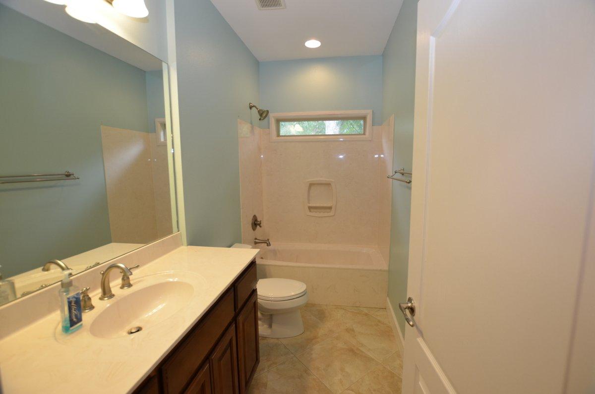 5952 Old Bethel Road Crestview, FL 32536 - Photo 17 of 25 a bathroom with a sink a toilet and shower