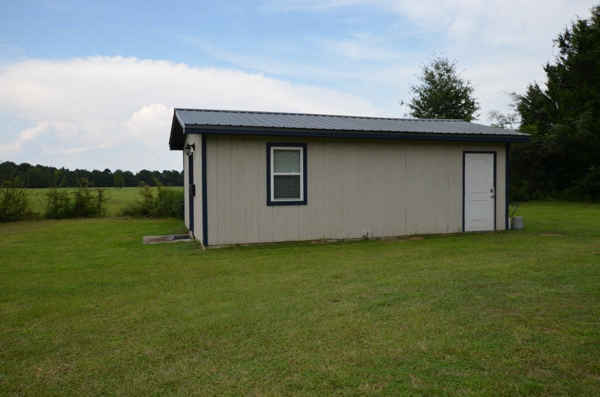 5952 Old Bethel Road Crestview, FL 32536 - Photo 25 of 25 a house with a yard