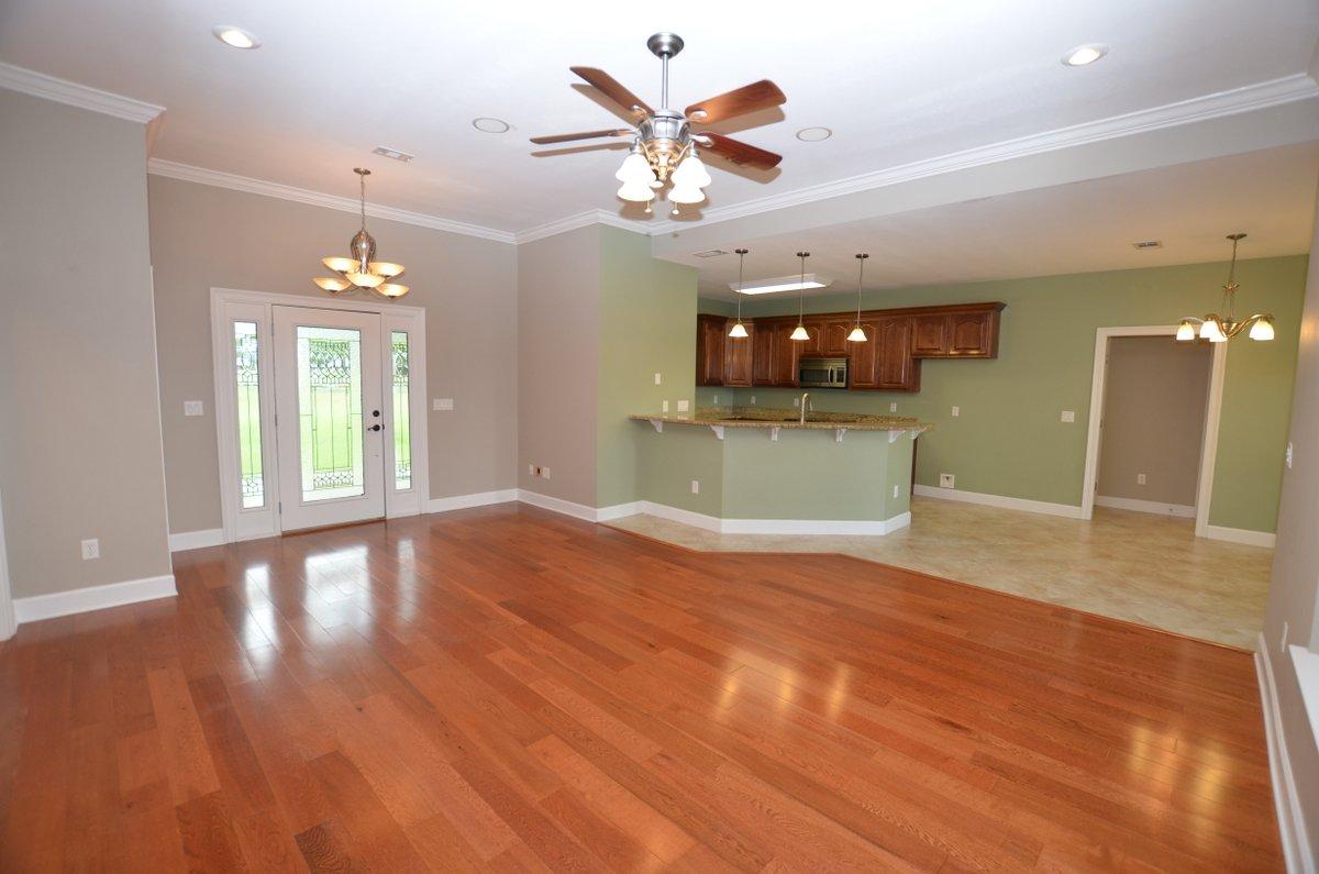 5952 Old Bethel Road Crestview, FL 32536 - Photo 4 of 25 a view of an empty room with window and wooden floor