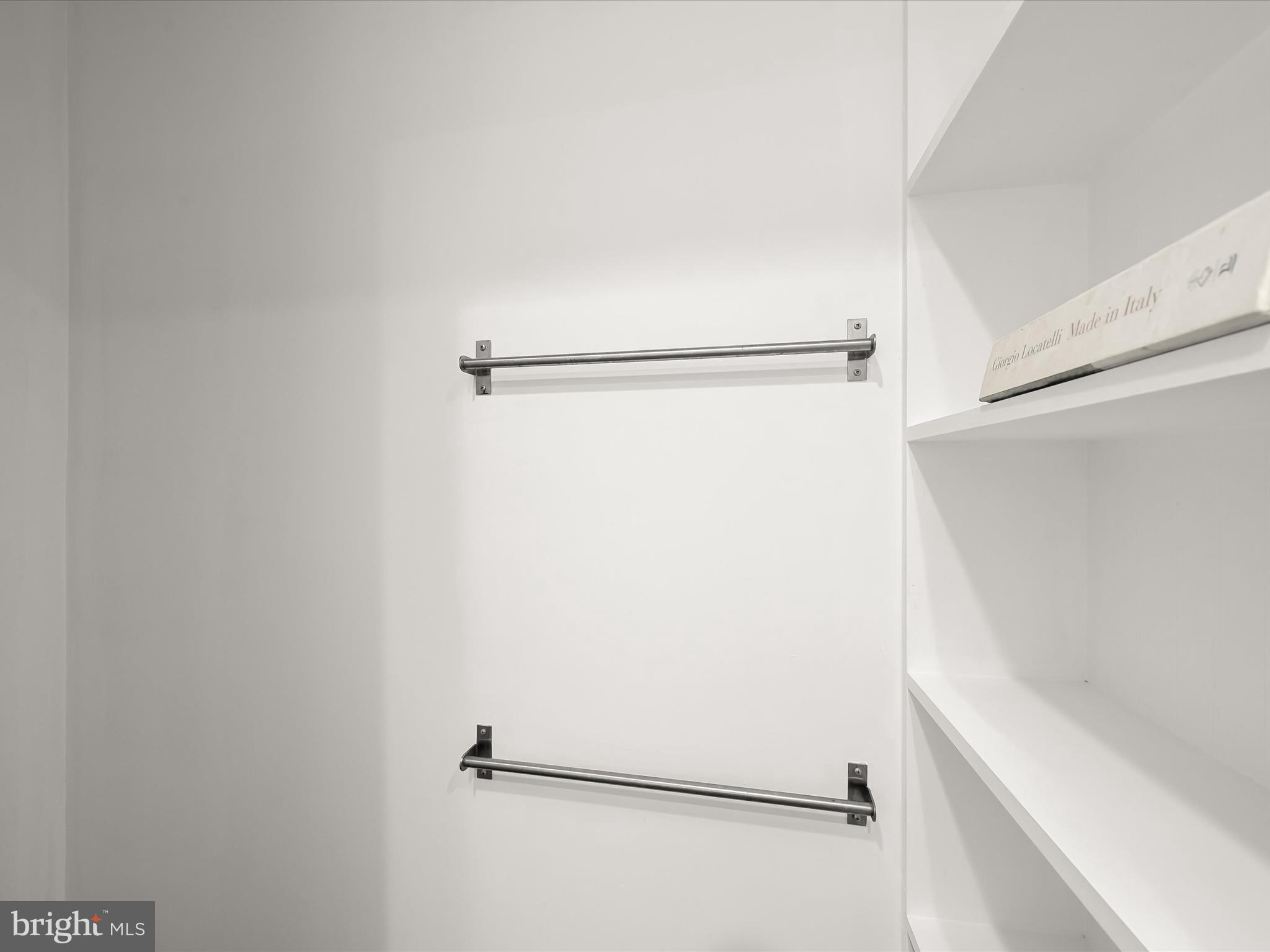 3407 Q Street Northwest Washington, DC 20007 - Photo 16 of 27 a view of small space with racks on the wall