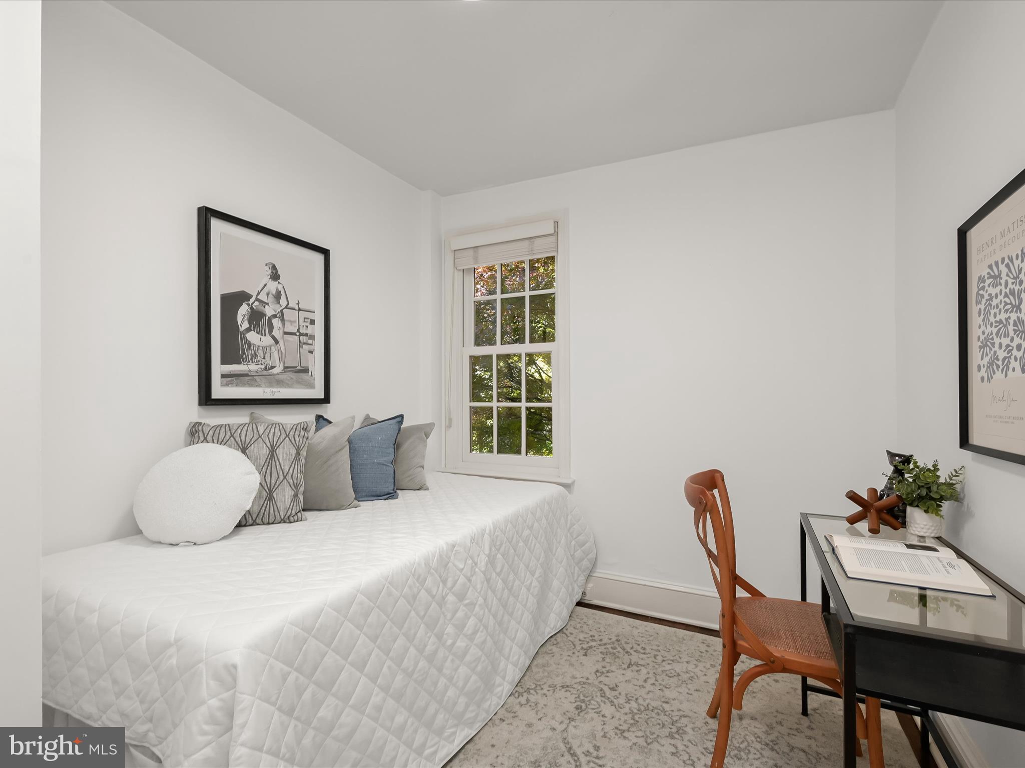 3407 Q Street Northwest Washington, DC 20007 - Photo 22 of 27 a bedroom with a bed and a window