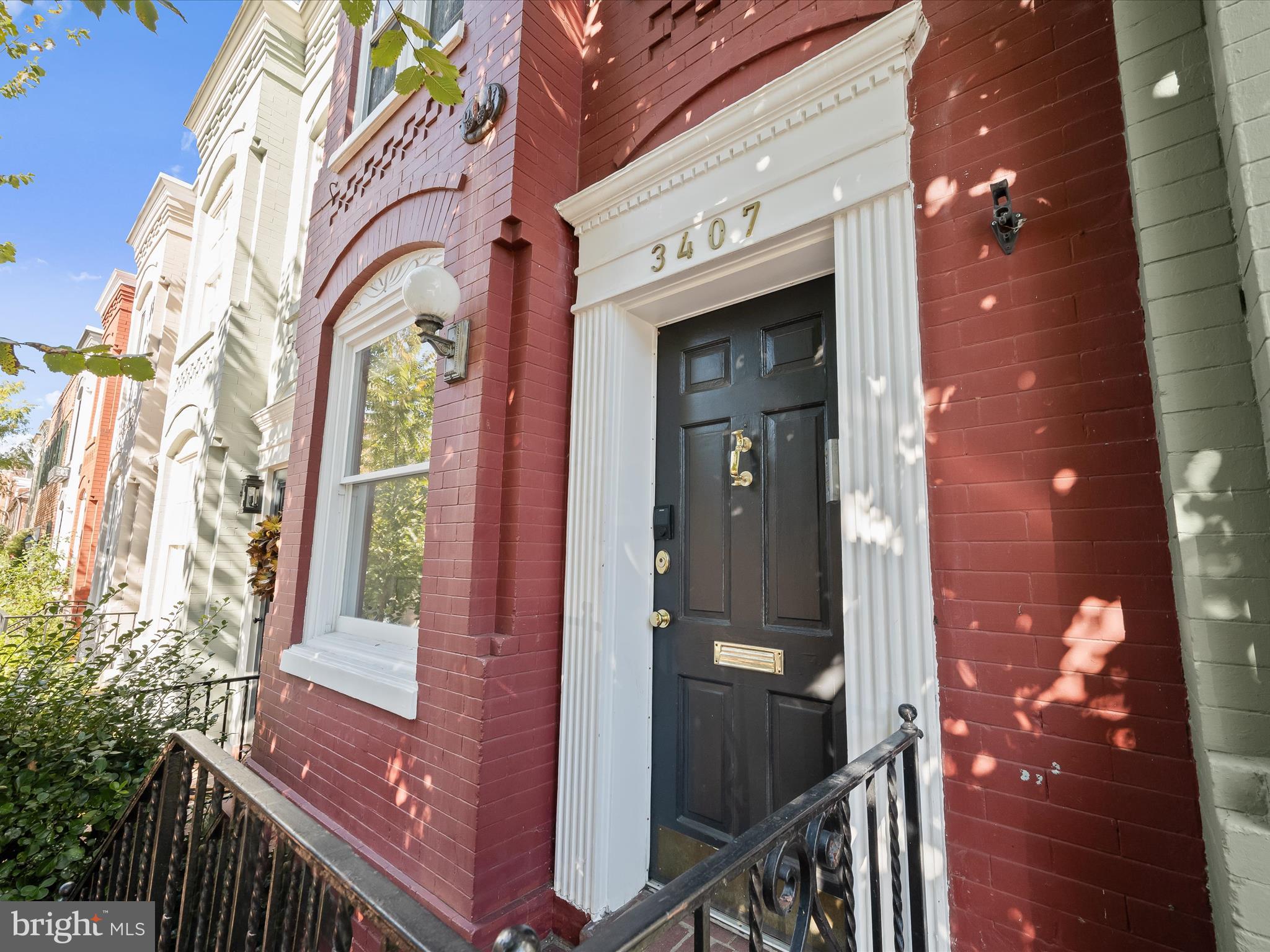 3407 Q Street Northwest Washington, DC 20007 - Photo 3 of 27 a view of a entryway door front of house