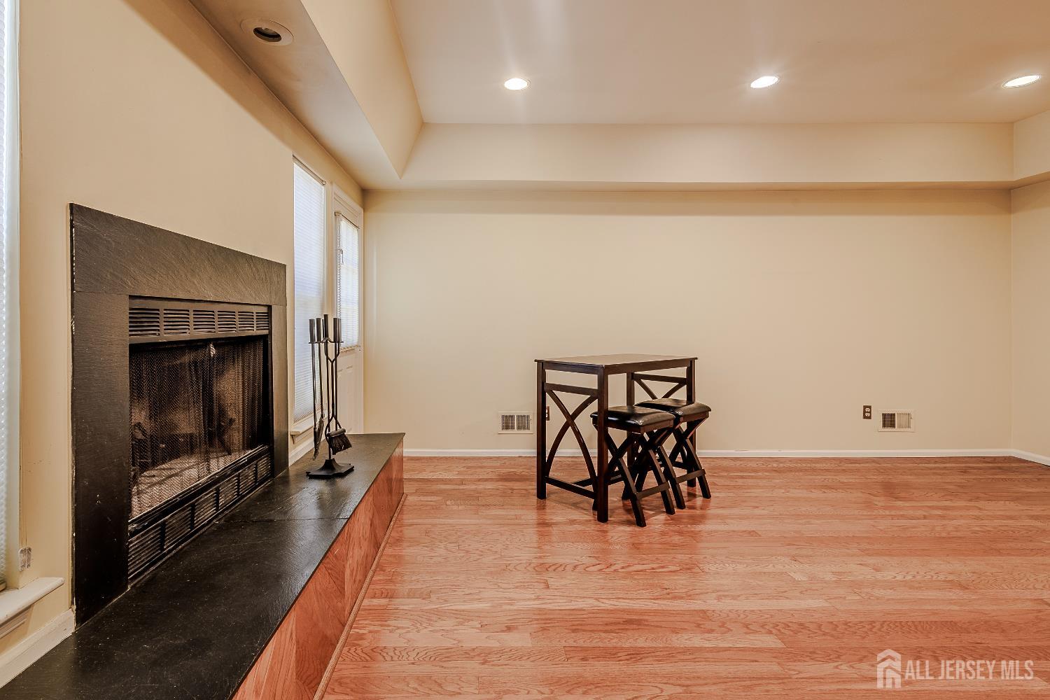 412 Hawkshead Way Somerset, NJ 08873 - Photo 14 of 35 a dining room with furniture and wooden floor