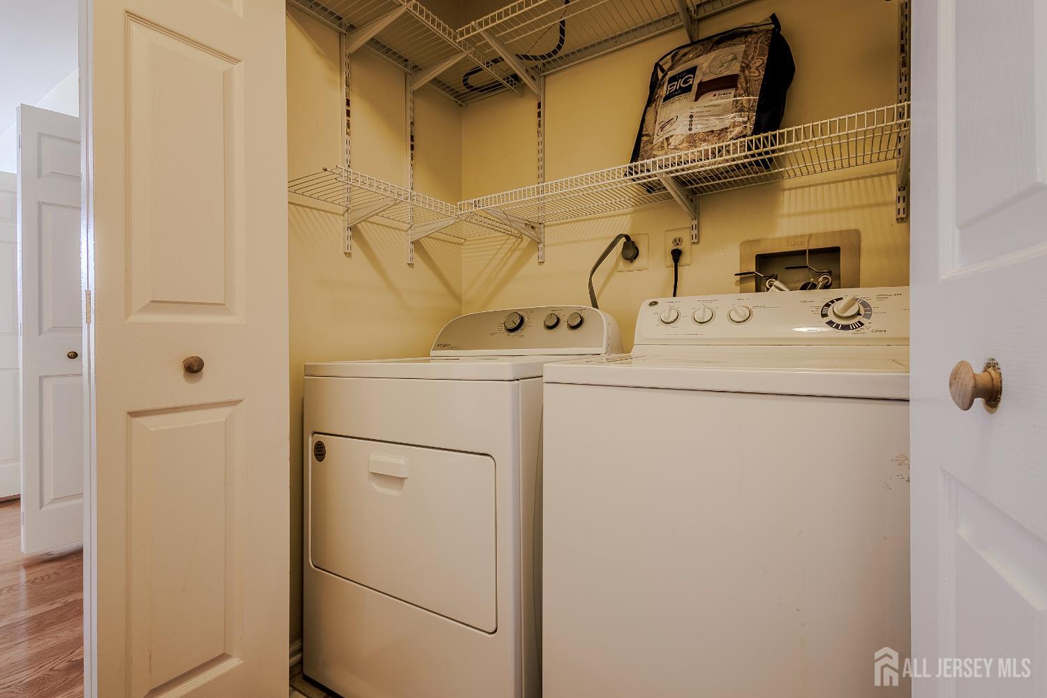 412 Hawkshead Way Somerset, NJ 08873 - Photo 19 of 35 a utility room with dryer and washer