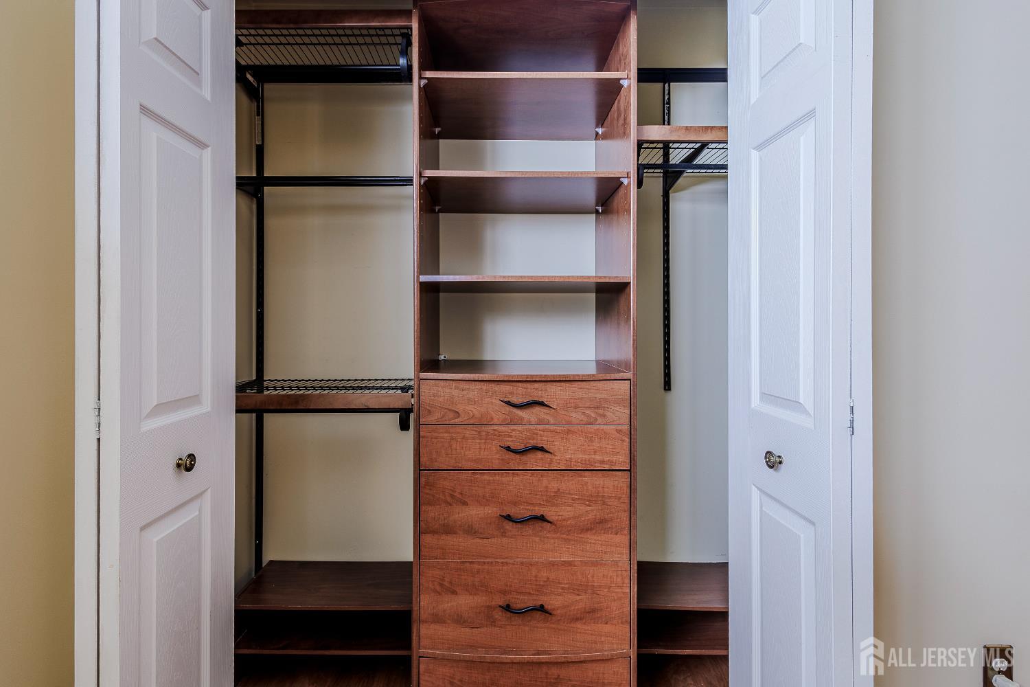 412 Hawkshead Way Somerset, NJ 08873 - Photo 22 of 35 a view of walk in closet with clothes