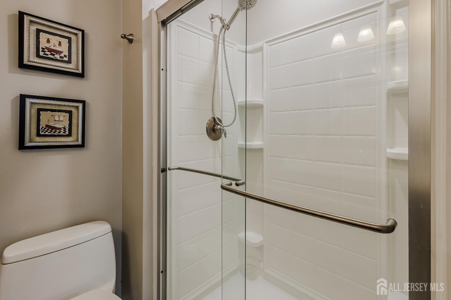 412 Hawkshead Way Somerset, NJ 08873 - Photo 24 of 35 a bathroom with a shower and a toilet