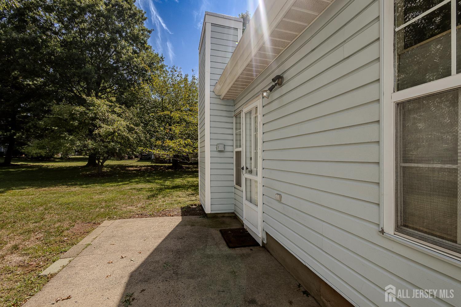 412 Hawkshead Way Somerset, NJ 08873 - Photo 25 of 35 a view of a backyard with lake view