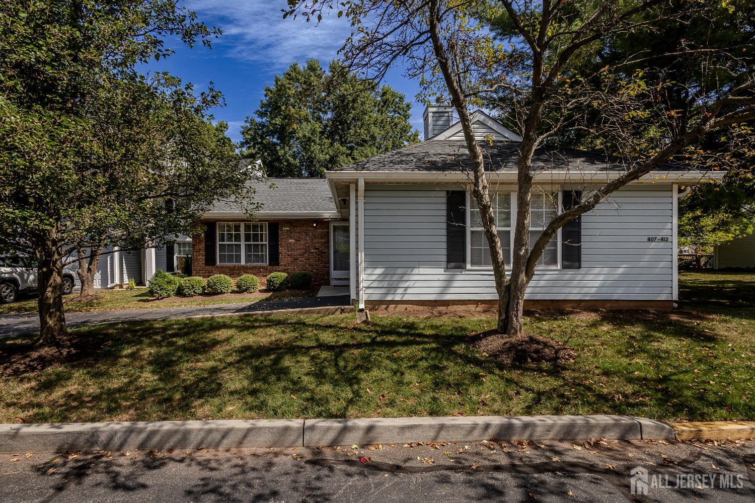412 Hawkshead Way Somerset, NJ 08873 - Photo 3 of 35 front view of a house with a yard