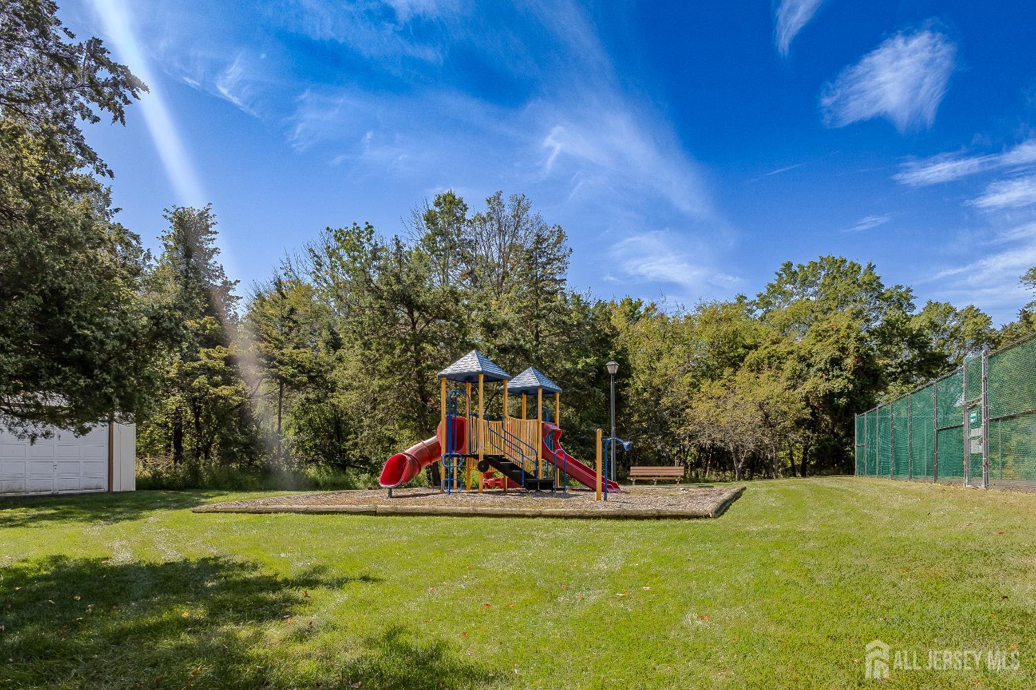 412 Hawkshead Way Somerset, NJ 08873 - Photo 34 of 35 a view of a house with a yard and basketball court