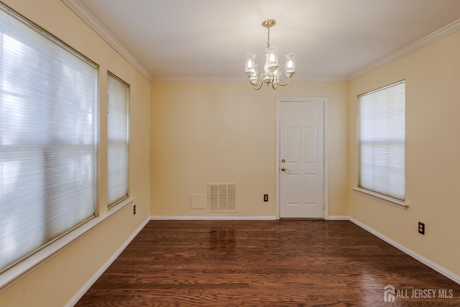 412 Hawkshead Way Somerset, NJ 08873 - Photo 7 of 35 a view of an empty room with a window