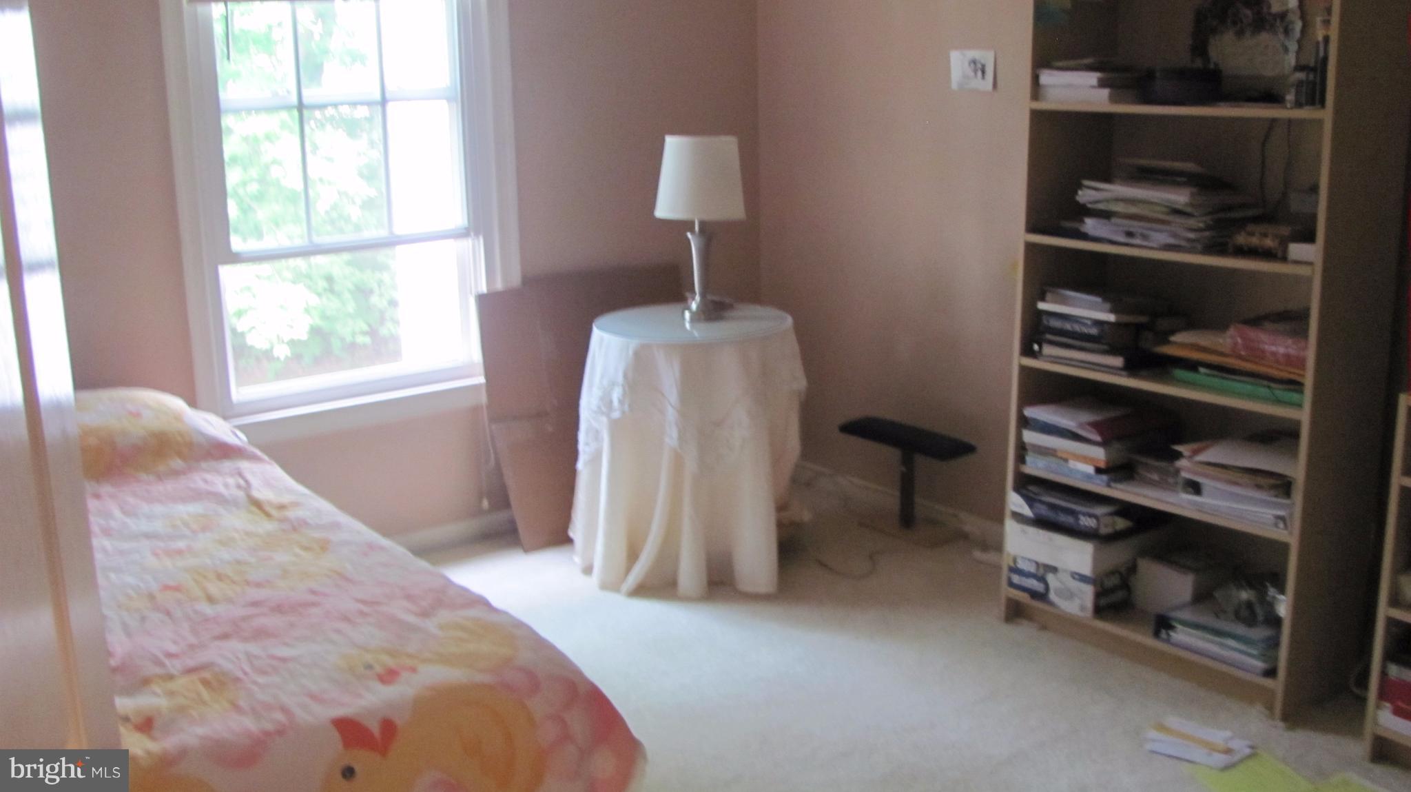 12705 Turquoise Terrace Silver Spring, MD 20904 - Photo 19 of 24 a view of a livingroom with wooden floor and a window