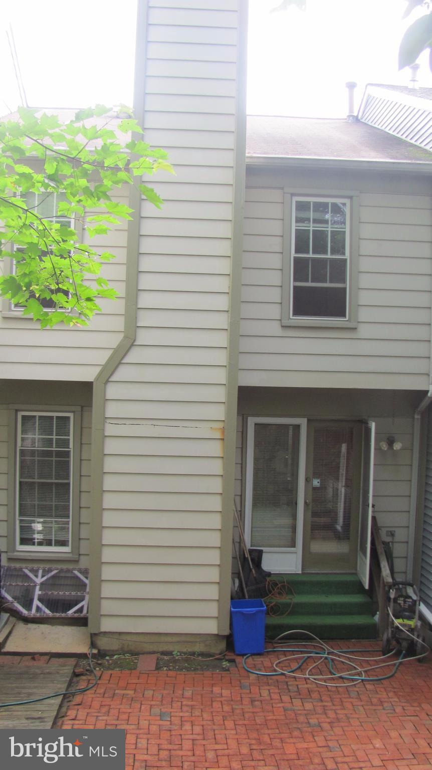 12705 Turquoise Terrace Silver Spring, MD 20904 - Photo 23 of 24 a front view of a house with a yard