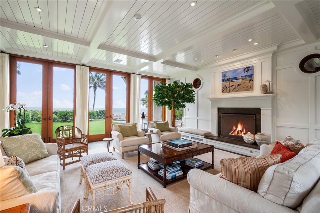 212 The Strand Manhattan Beach, CA 90266 - Photo 11 of 75 a living room with furniture and a fireplace