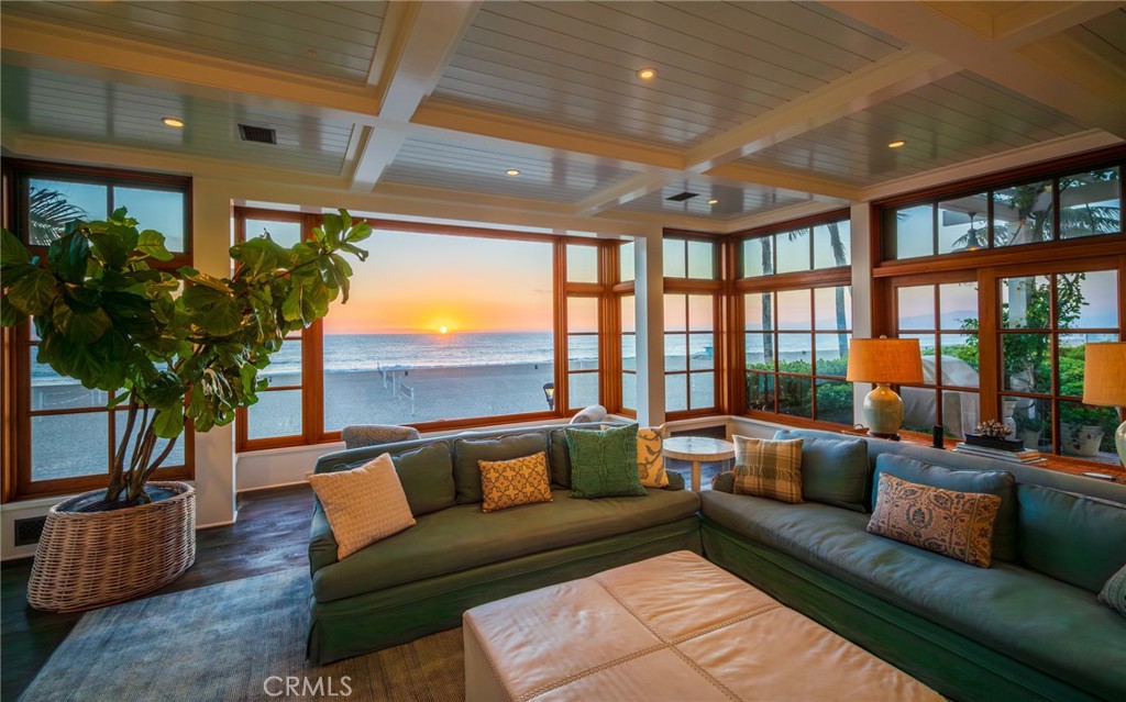 212 The Strand Manhattan Beach, CA 90266 - Photo 12 of 75 a living room with furniture and a large window