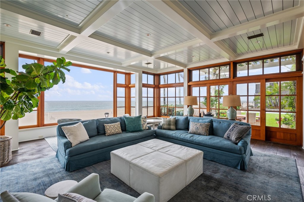 212 The Strand Manhattan Beach, CA 90266 - Photo 14 of 75 a living room with furniture and a large window