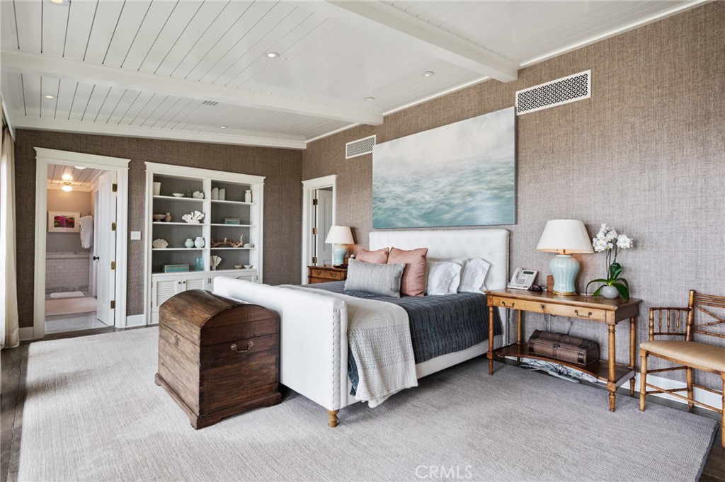 212 The Strand Manhattan Beach, CA 90266 - Photo 38 of 75 a bed room with a bed and a chair