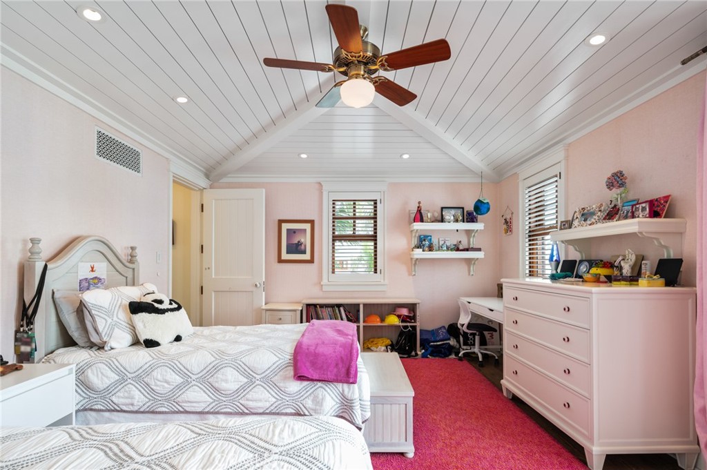 212 The Strand Manhattan Beach, CA 90266 - Photo 46 of 75 a bed room with a bed and a window