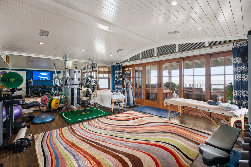 212 The Strand Manhattan Beach, CA 90266 - Photo 48 of 75 a bed room with a bed and a large window