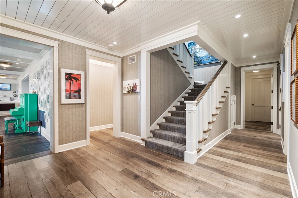 212 The Strand Manhattan Beach, CA 90266 - Photo 53 of 75 a view of entryway with wooden floor and stairs
