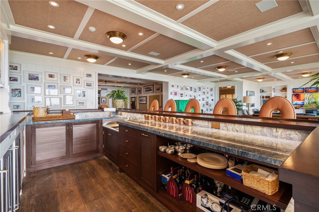 212 The Strand Manhattan Beach, CA 90266 - Photo 56 of 75 a kitchen with stainless steel appliances granite countertop a lot of counter space
