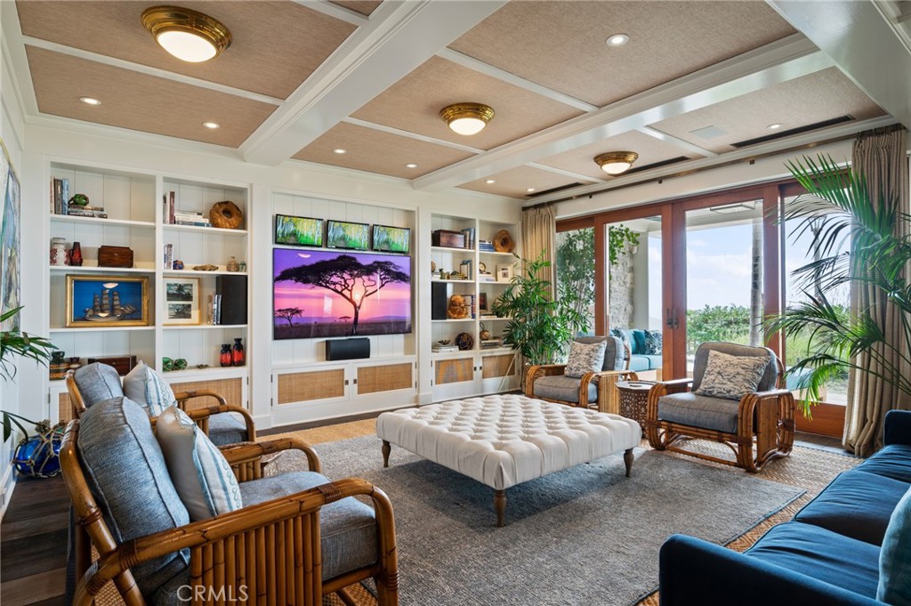 212 The Strand Manhattan Beach, CA 90266 - Photo 58 of 75 a living room with furniture and a floor to ceiling window