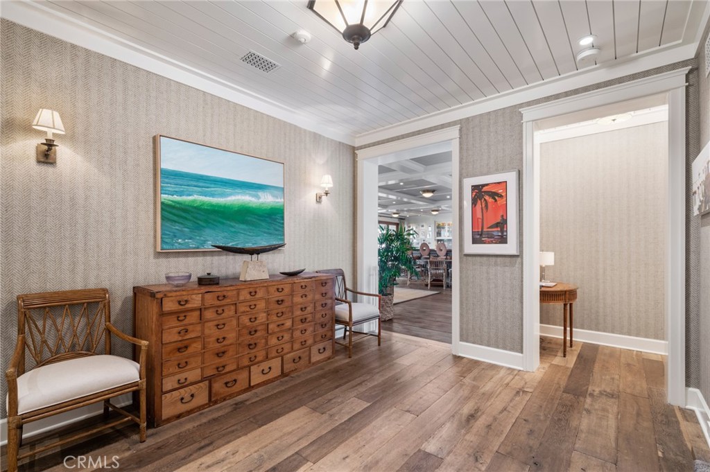 212 The Strand Manhattan Beach, CA 90266 - Photo 65 of 75 a living room with furniture and a flat screen tv