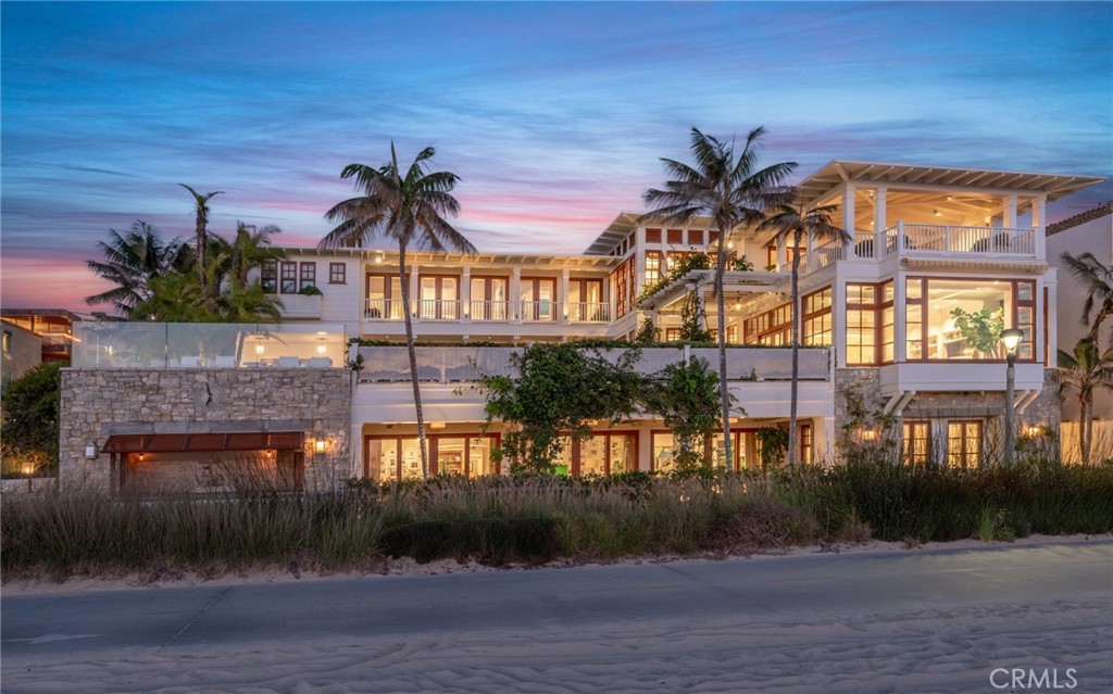 212 The Strand Manhattan Beach, CA 90266 - Photo 72 of 75 a front view of a house with a yard