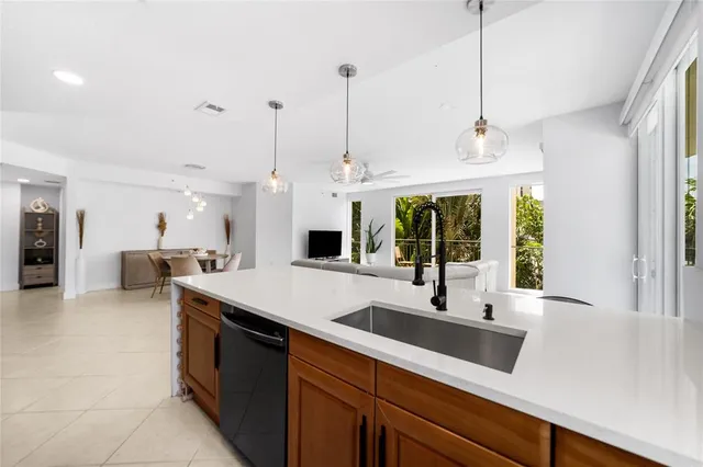 a view of a dining room with furniture and window