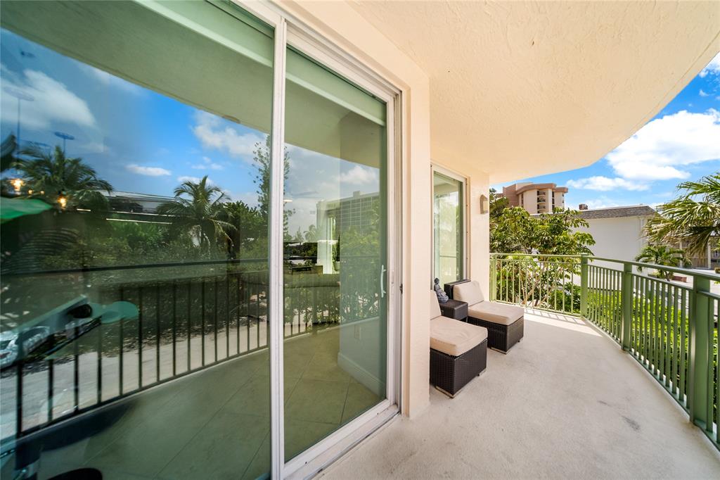 3210 Northeast 5th Street, Unit 203 Pompano Beach, FL 33062 - Photo 25 of 61 a view of a balcony