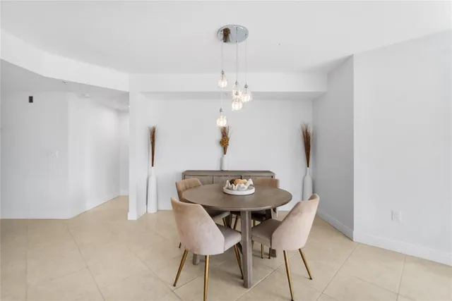 a bathroom with a double vanity sink a toilet and a mirror
