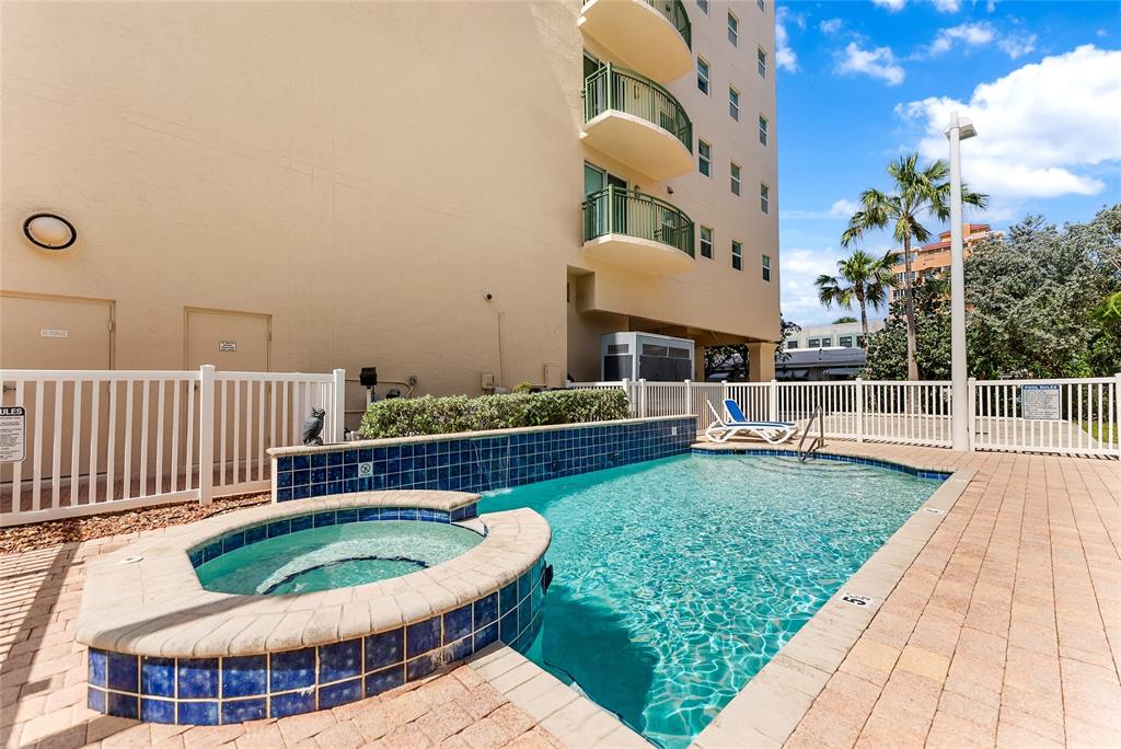 3210 Northeast 5th Street, Unit 203 Pompano Beach, FL 33062 - Photo 60 of 61 a view of a chair and tables