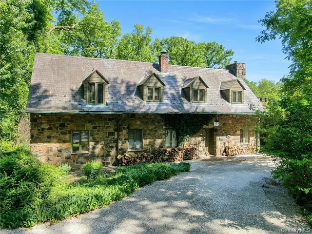 an aerial view of a house with garden