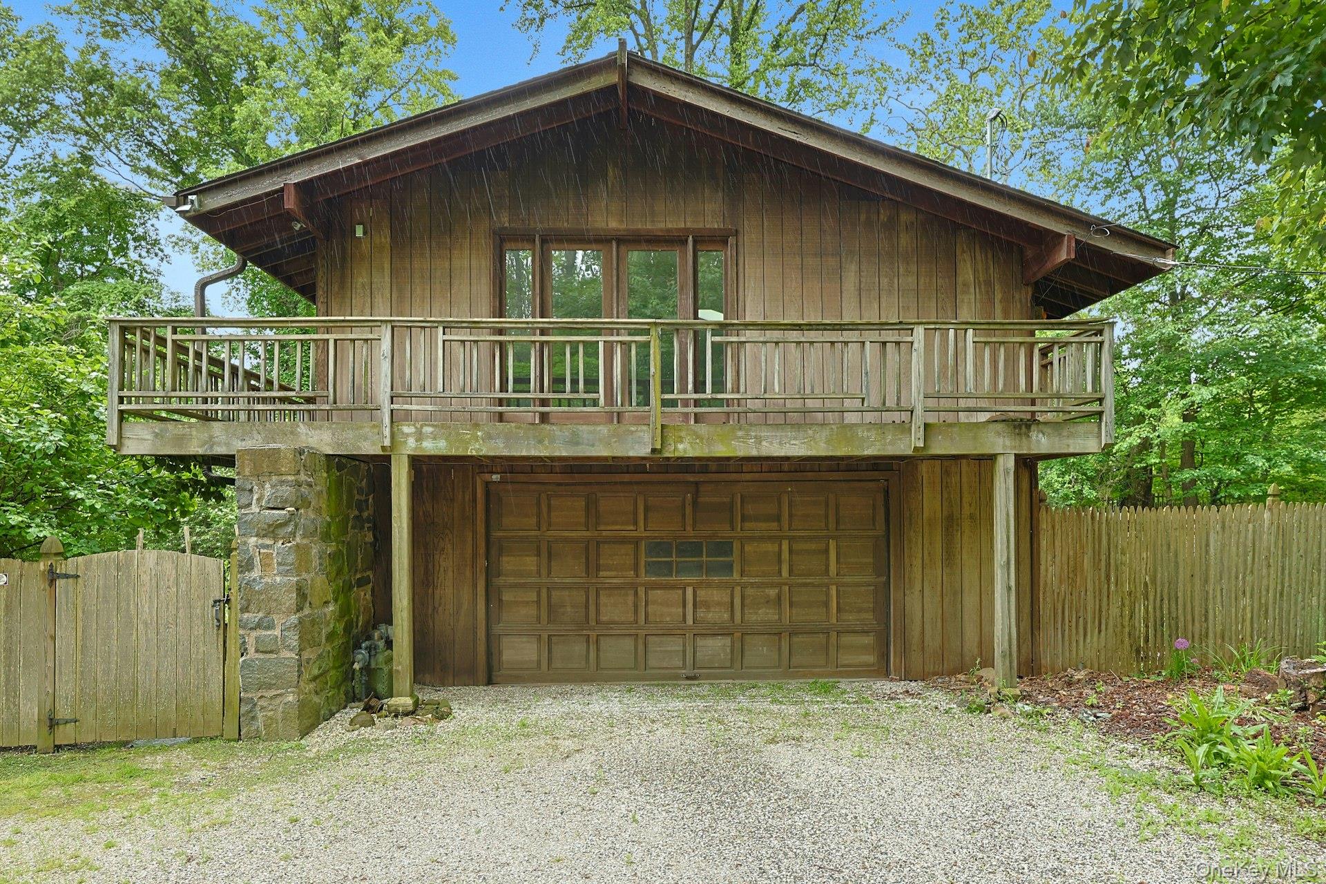 21 Woods Road Palisades, NY 10964 - Photo 38 of 47 a front view of a house with a garden