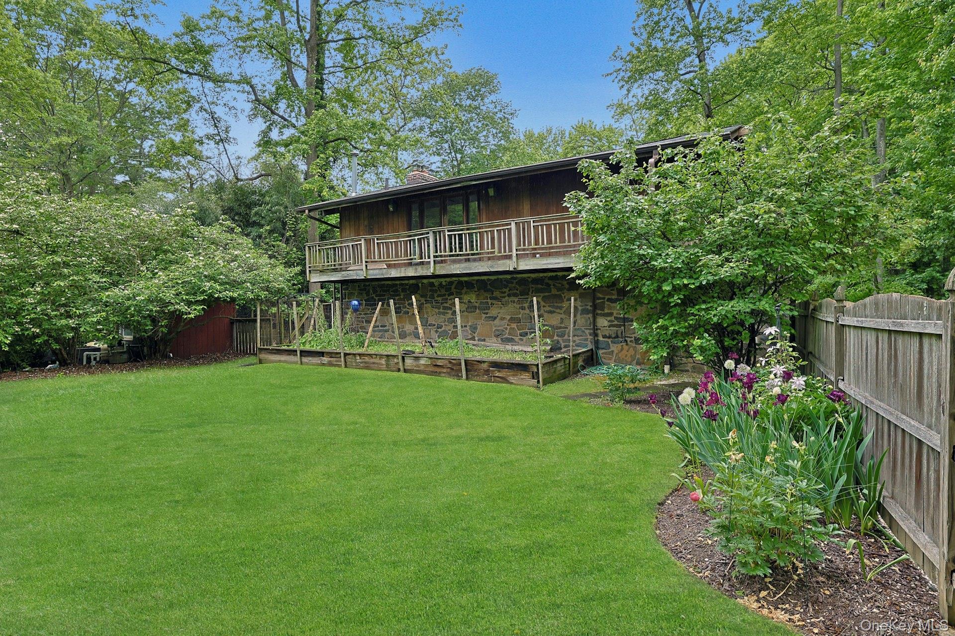 21 Woods Road Palisades, NY 10964 - Photo 39 of 47 a view of house with backyard and garden