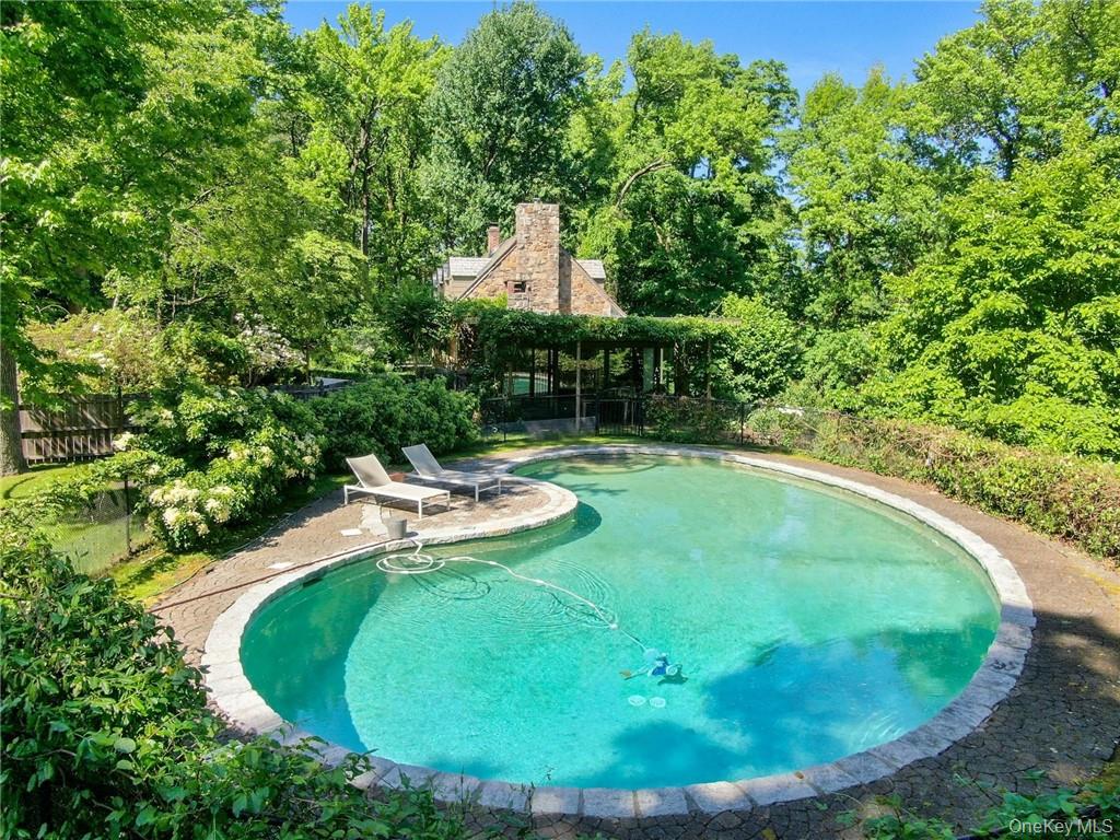 21 Woods Road Palisades, NY 10964 - Photo 8 of 47 a view of a swimming pool with a outdoor seating