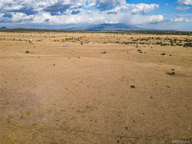 a view of beach and an ocean