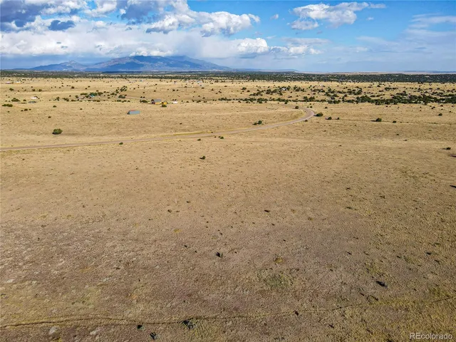 a view of beach and an ocean