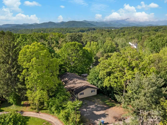a view of a yard with an outdoor space
