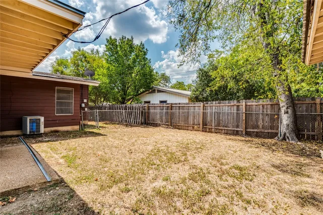 a bathroom with a sink and a yard