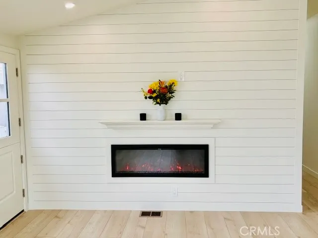 a living room with a fireplace