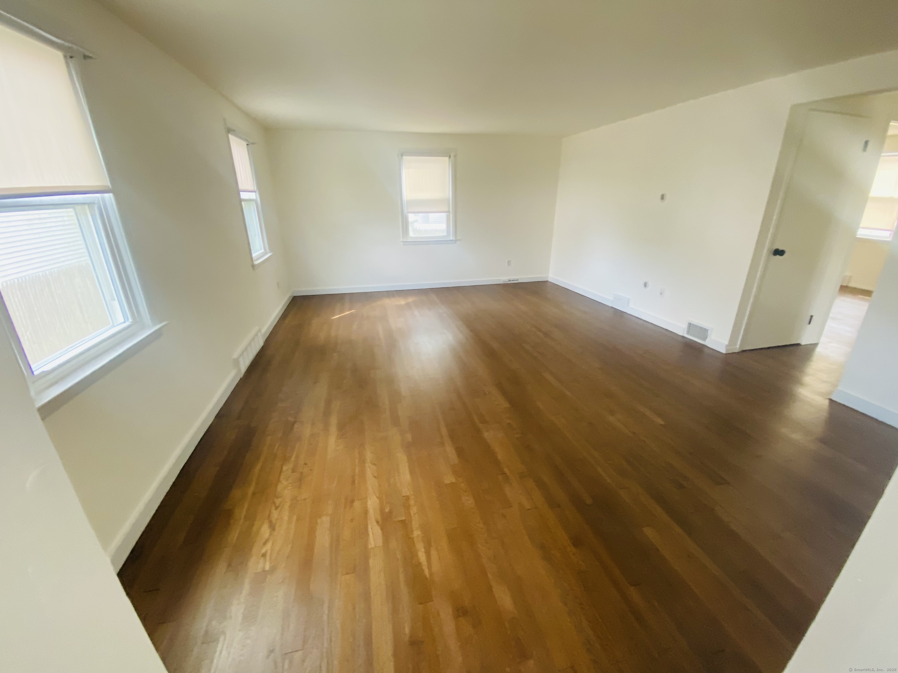 35 Harding Avenue Stratford, CT 06615 - Photo 5 of 10 wooden floor in a hall with an entryway