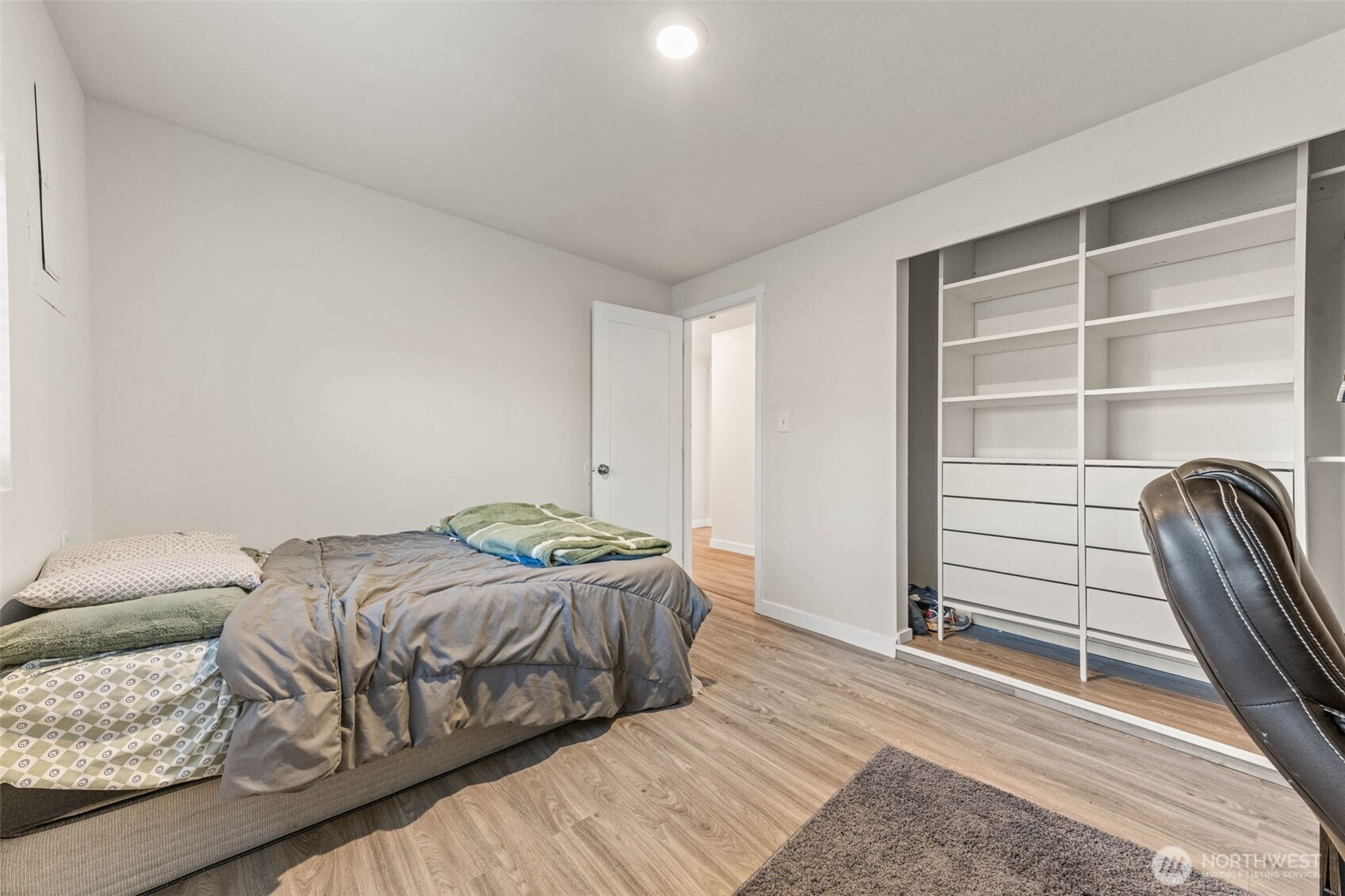 503 Coe Lane Southwest Orting, WA 98360 - Photo 18 of 26 a bedroom with a bed and a window