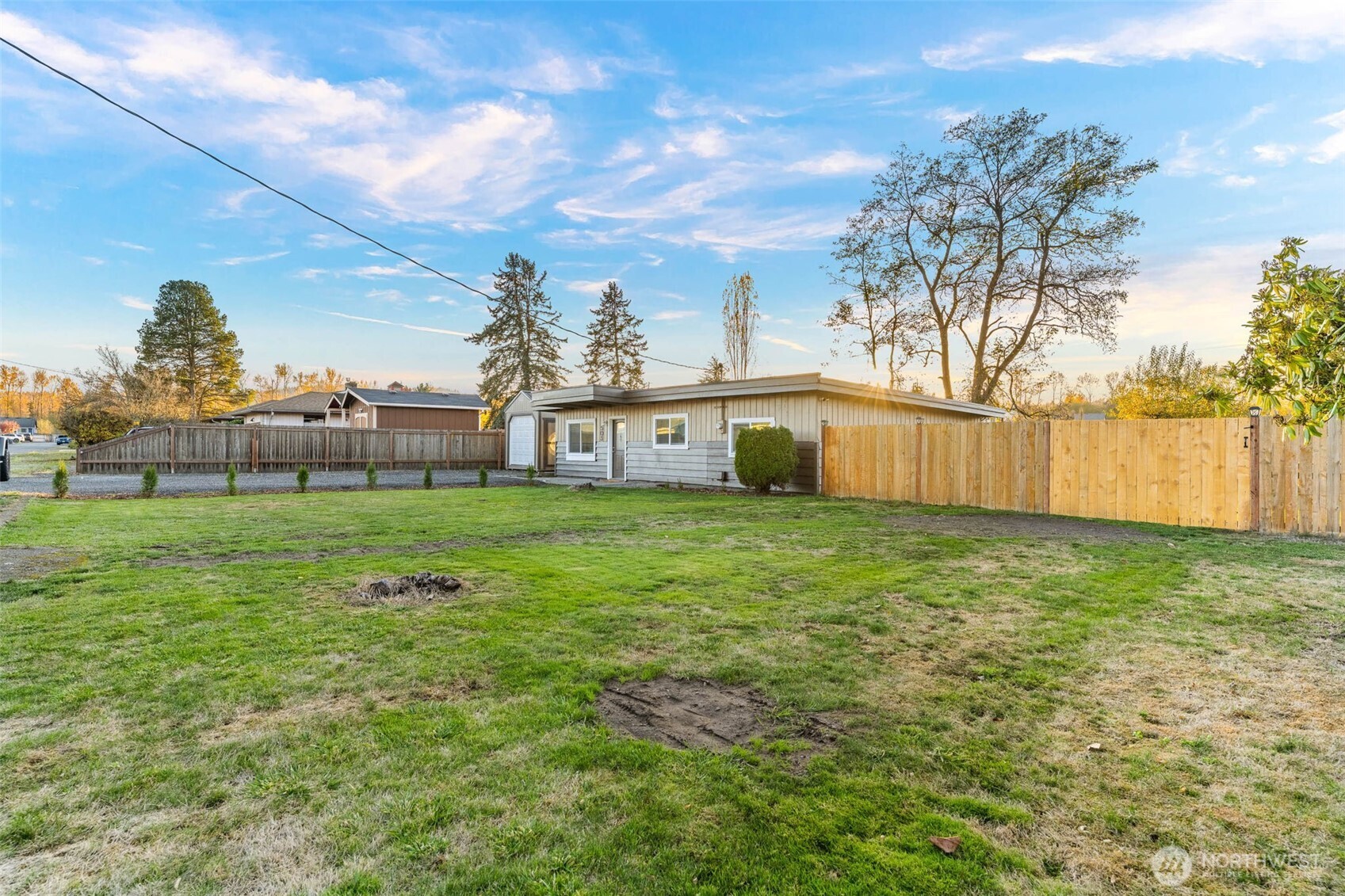 503 Coe Lane Southwest Orting, WA 98360 - Photo 2 of 26 a view of a house with backyard
