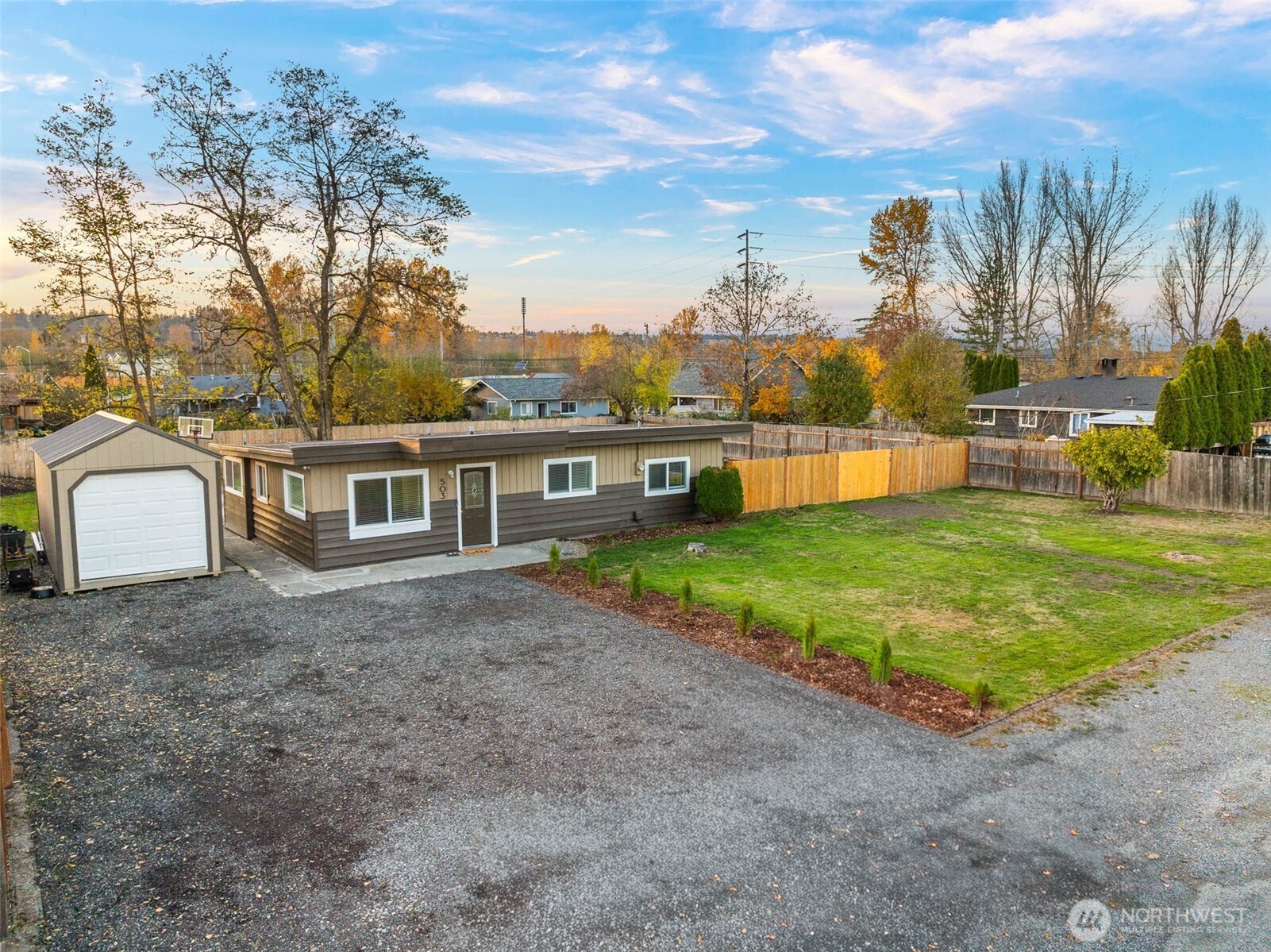 503 Coe Lane Southwest Orting, WA 98360 - Photo 4 of 26 a view of an outdoor space with garden and trees