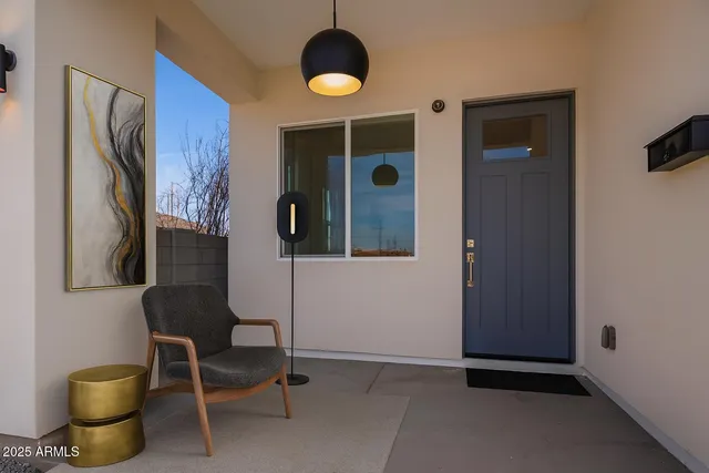 a view of a livingroom with furniture and front door