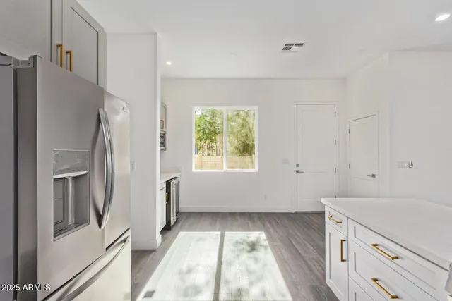 a view of kitchen with washer and dryer