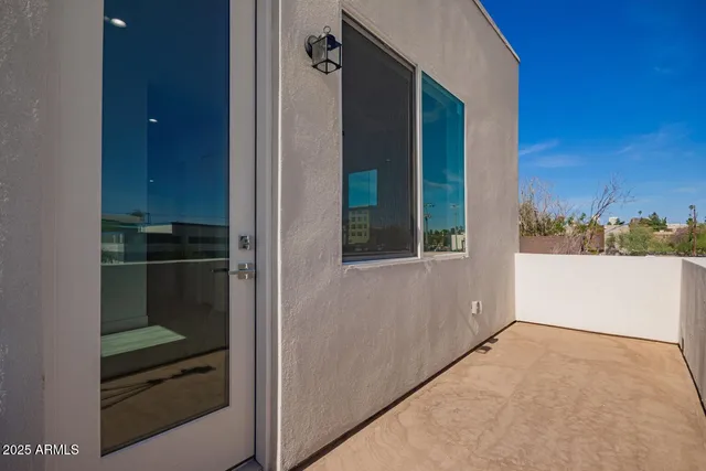 a view of a house with a patio