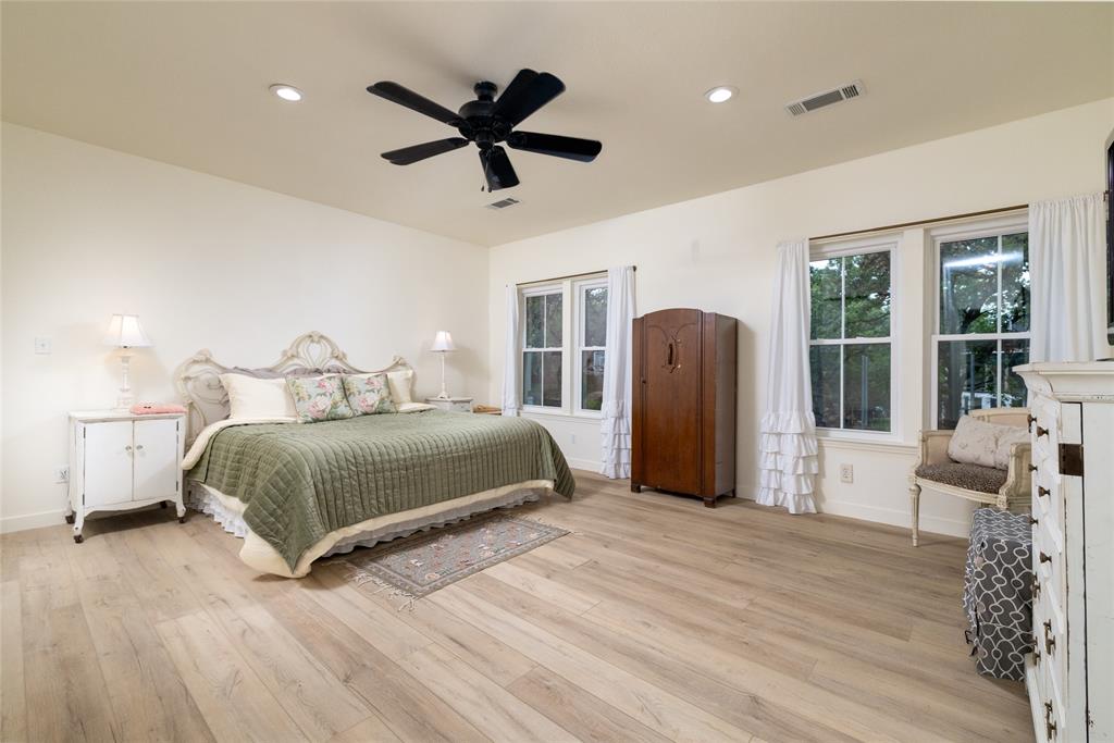 8948 David Fort Road Argyle, TX 76226 - Photo 19 of 39 Spacious room featuring light wood-finish flooring, recessed lighting, and a ceiling fan