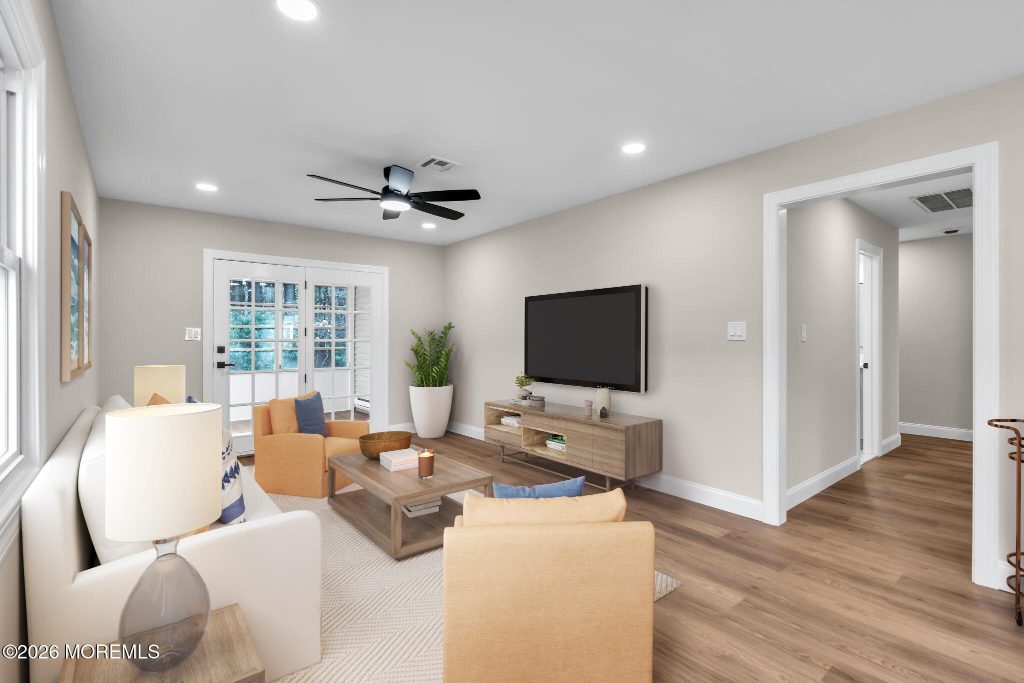 17 Meadowbrook Road Brick, NJ 08723 - Photo 15 of 36 a living room with furniture and a flat screen tv