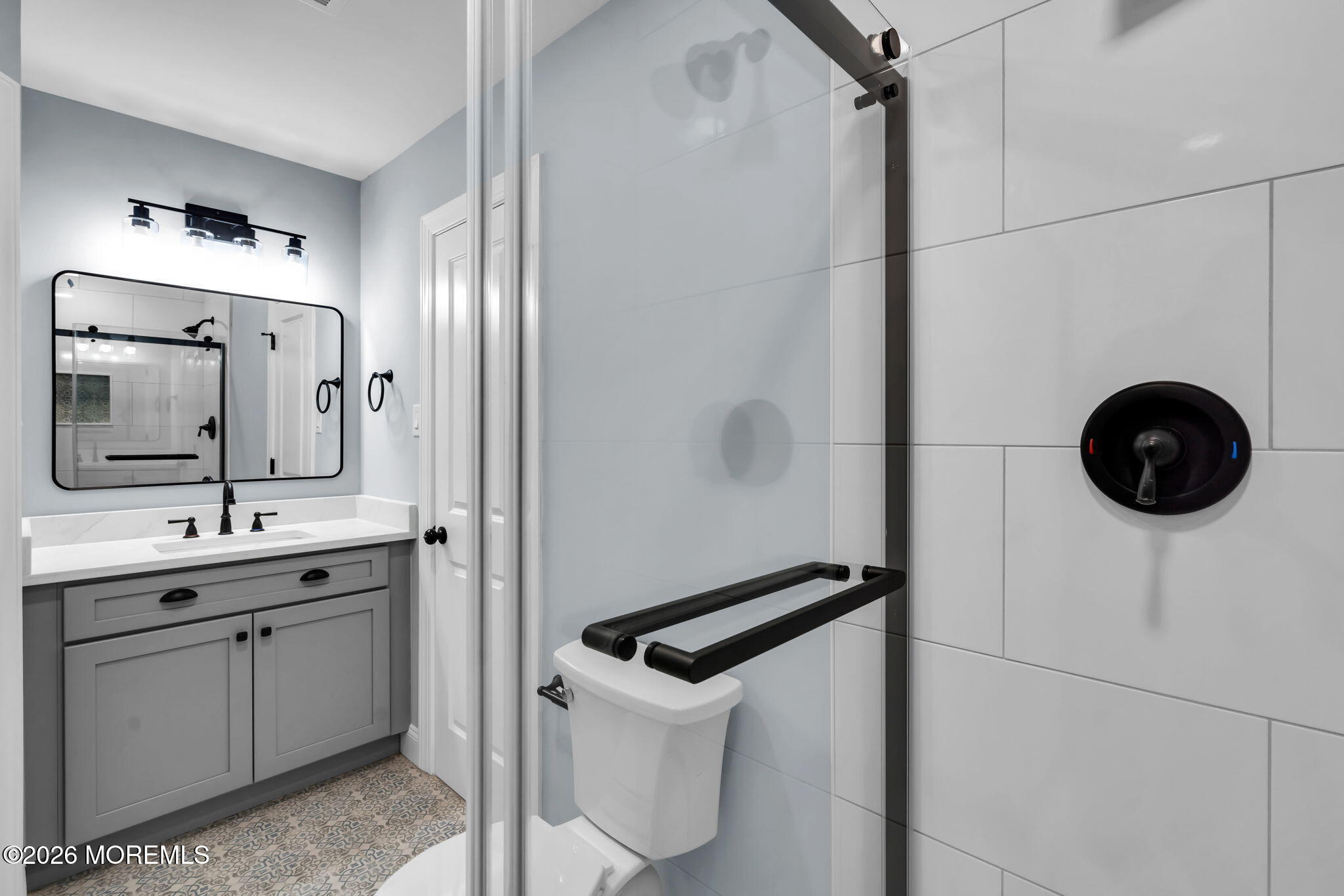 17 Meadowbrook Road Brick, NJ 08723 - Photo 17 of 36 a bathroom with a double vanity sink and mirror